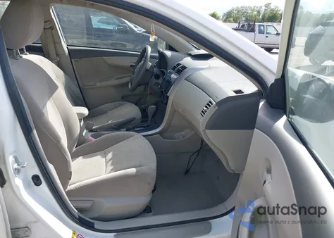 2009 Toyota Corolla from USA, damaged, VIN JTDBL40E799023254